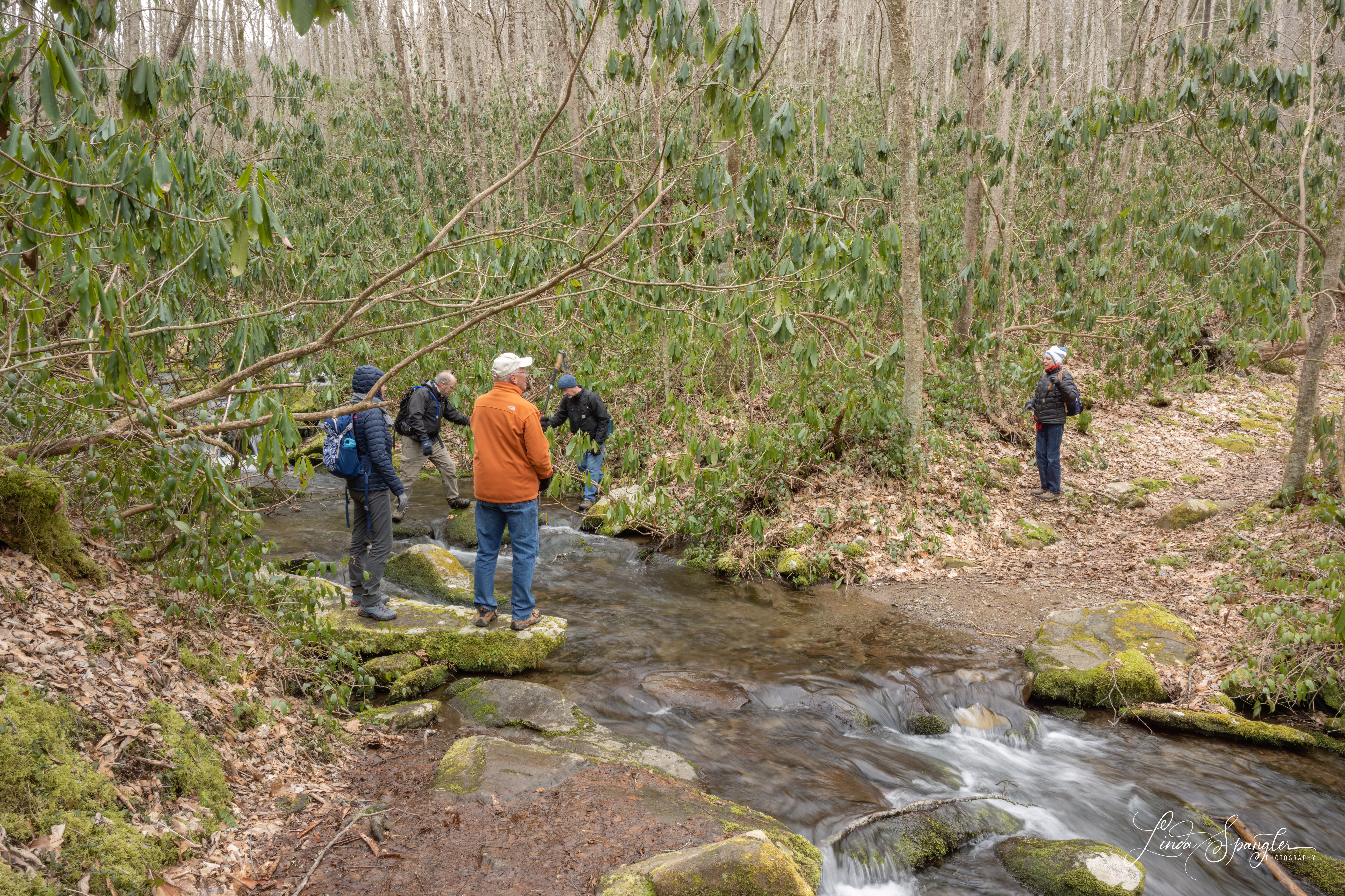 Hikers cross Jakes Creek